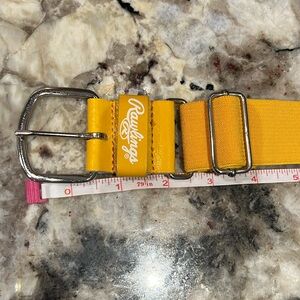 Golden yellow Rawlings adjustable softball/baseball belt